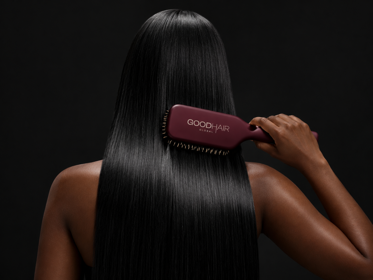 Long straight hair being brushed with a Good Hair Global brush