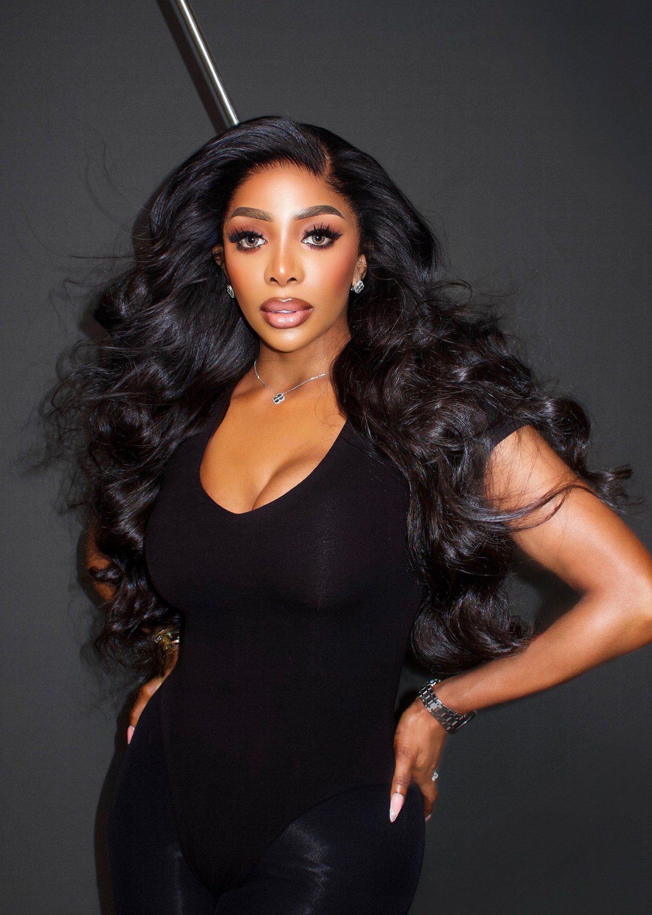 Chioma wearing voluminous curly hair